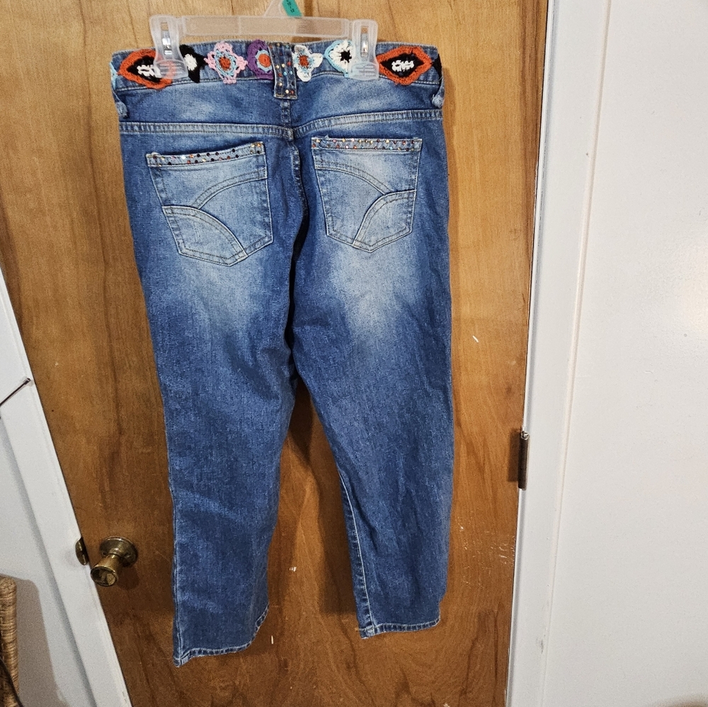 Size 4 TOO-SHE-SHE jeans.  Multicolored stoning and colorful crochet belt.